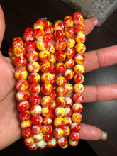 Load image into Gallery viewer, Red with yellow glass bead strand
