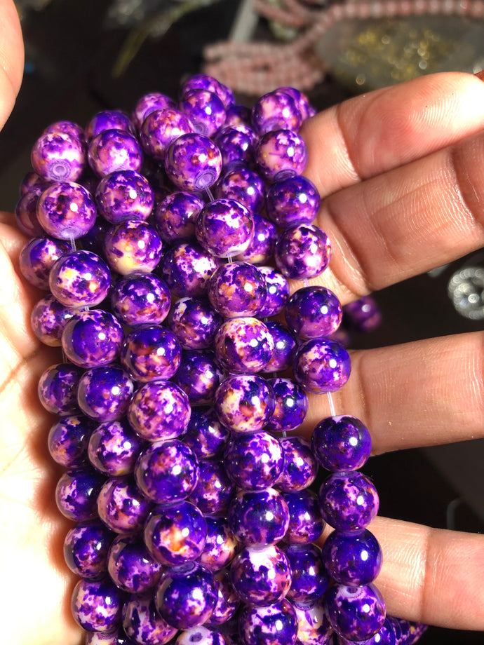 Purple marble glass bead strand